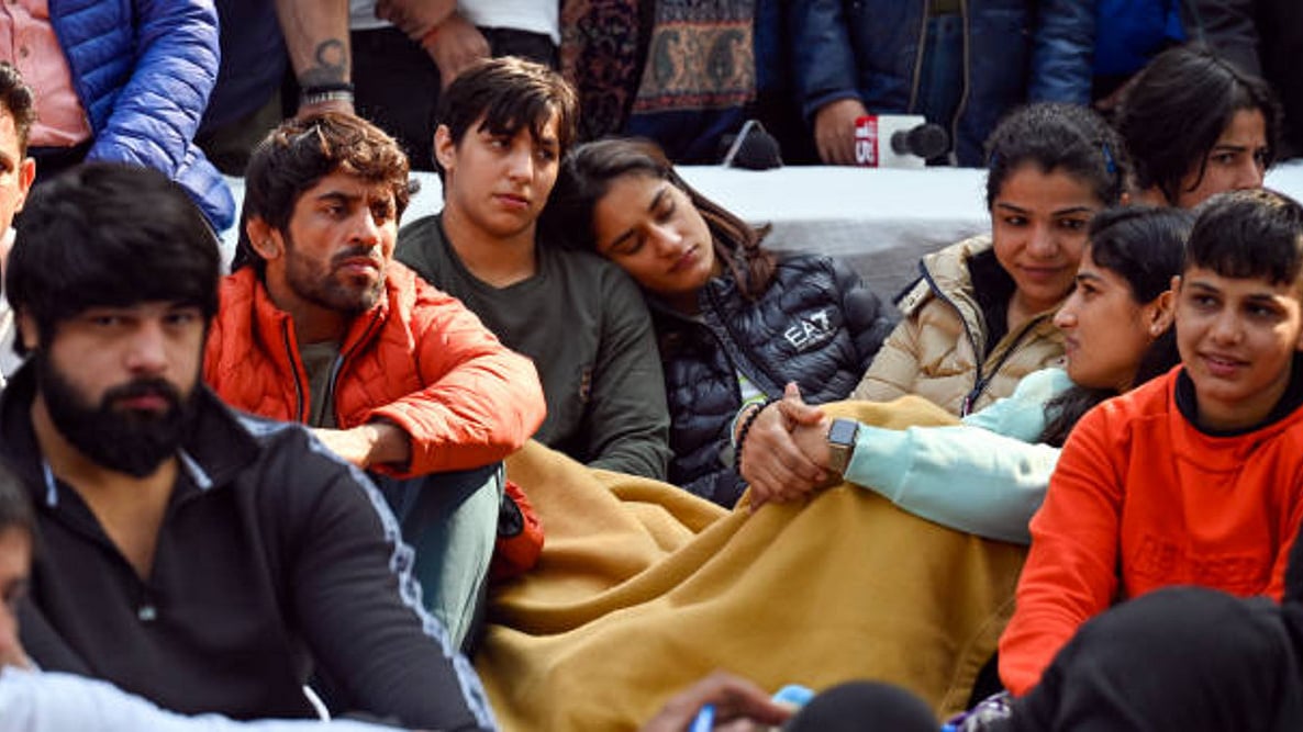 Wrestlers Vinesh Phogat, Sakshi Malik, Bajrang Punia protest against the WFI (photo: Getty Images)