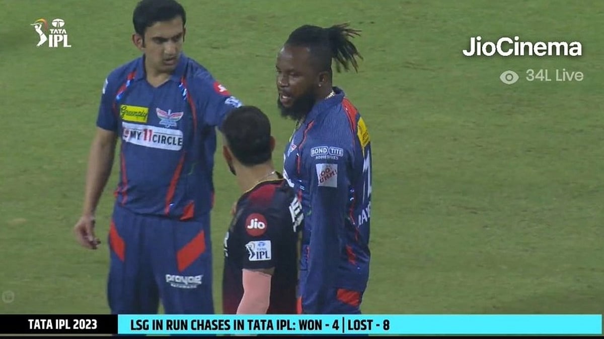 Gautam Gambhir and Virat Kohli facing off, while Kyle Mayers seems to intervene (photo courtesy @RoflGandhi_/Twitter)