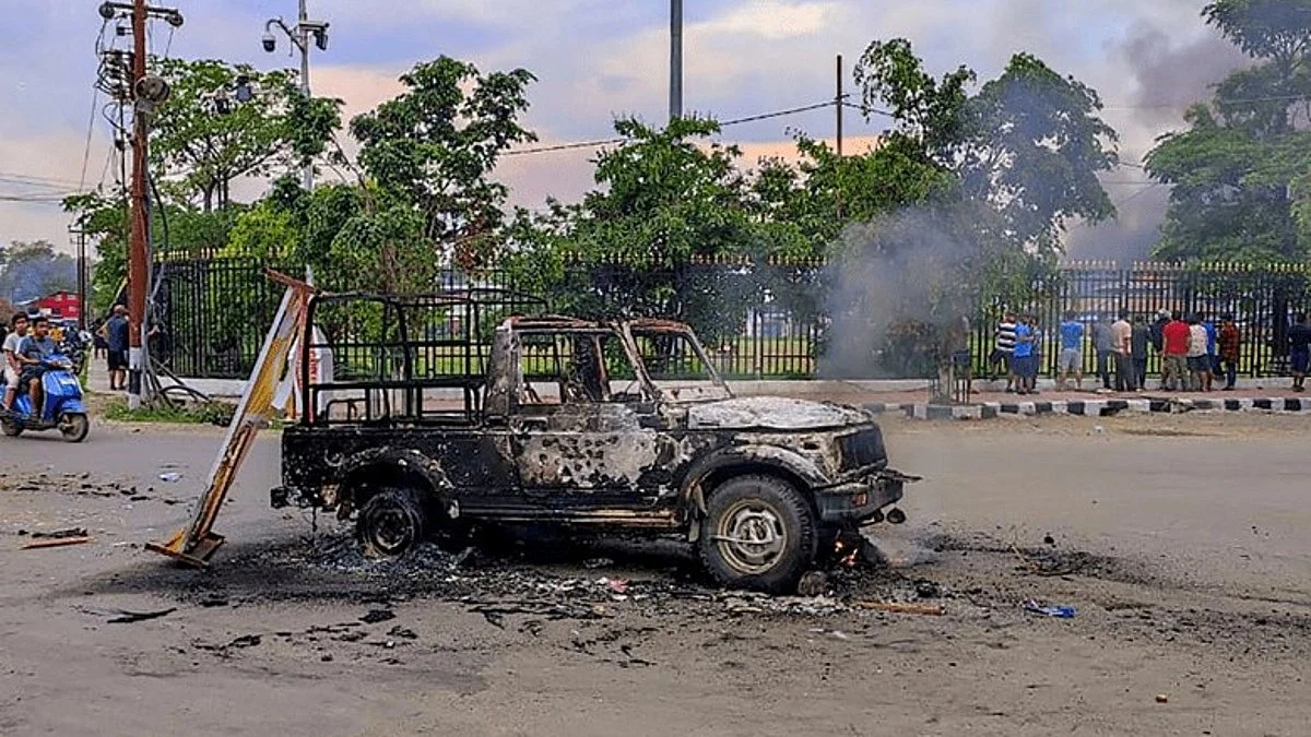 A burnt vehicle in violence-hit Manipur (Photo Courtesy: @ashoswai/Twitter)
