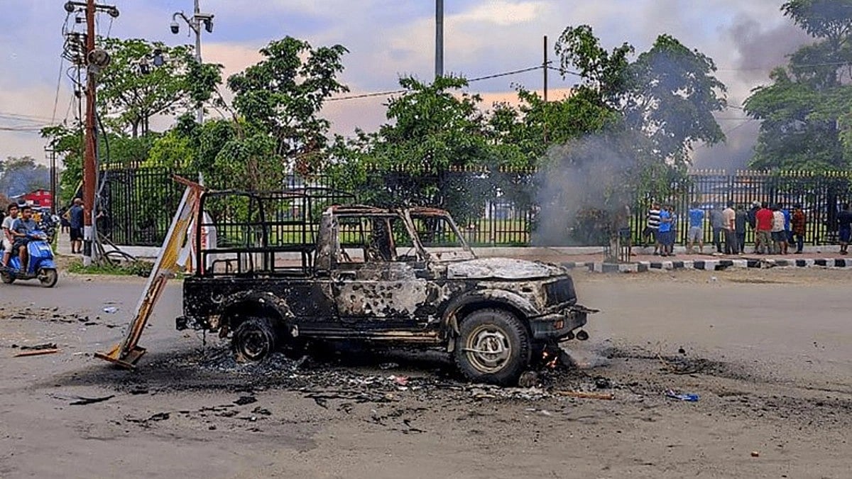 A burnt vehicle in violence-hit Manipur (Photo Courtesy: @ashoswai/Twitter)