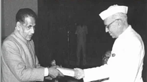 Firaq receiving an award from Nehru (IANS Photo)