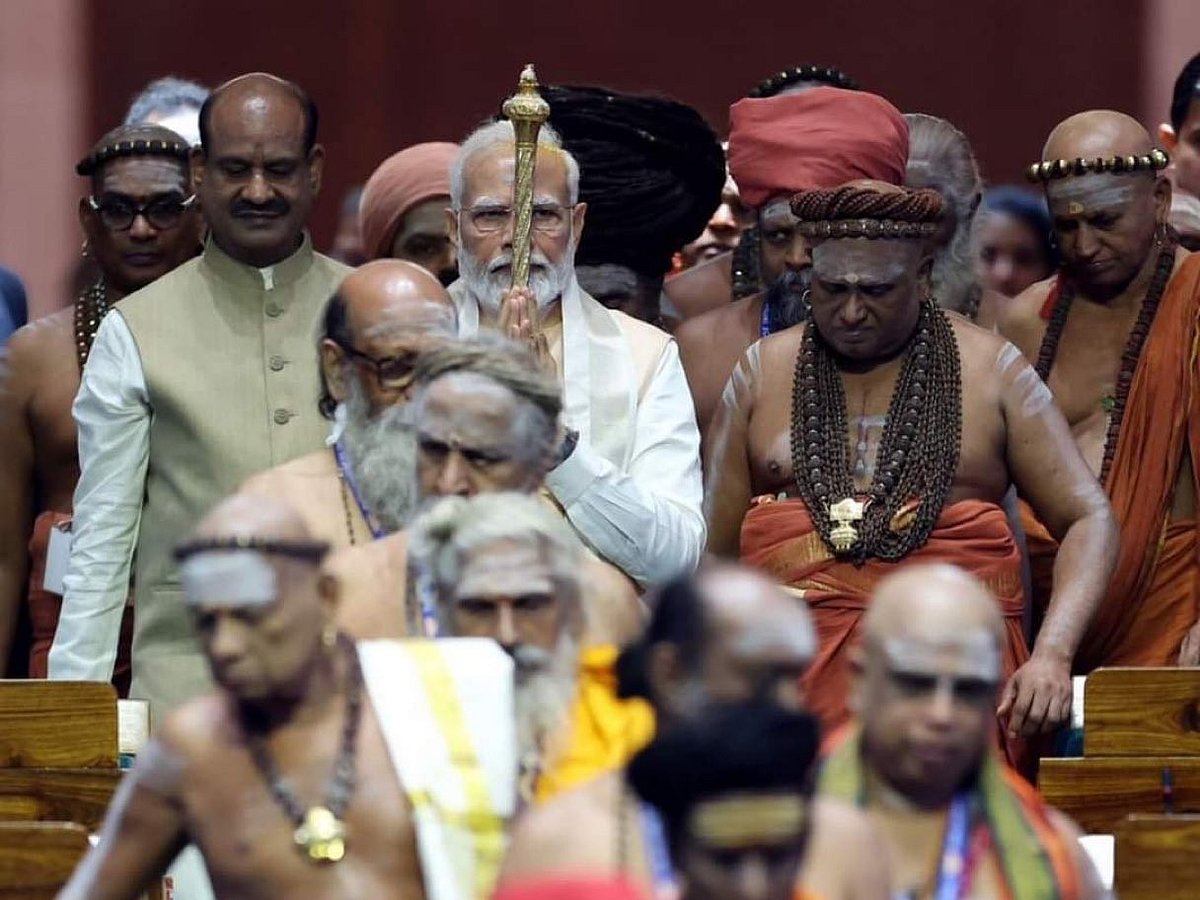 The prime minister carried a sengol he had already paid obeisance to into the Lok Sabha flanked by ranks of Hindu high priests (Photo PIB)