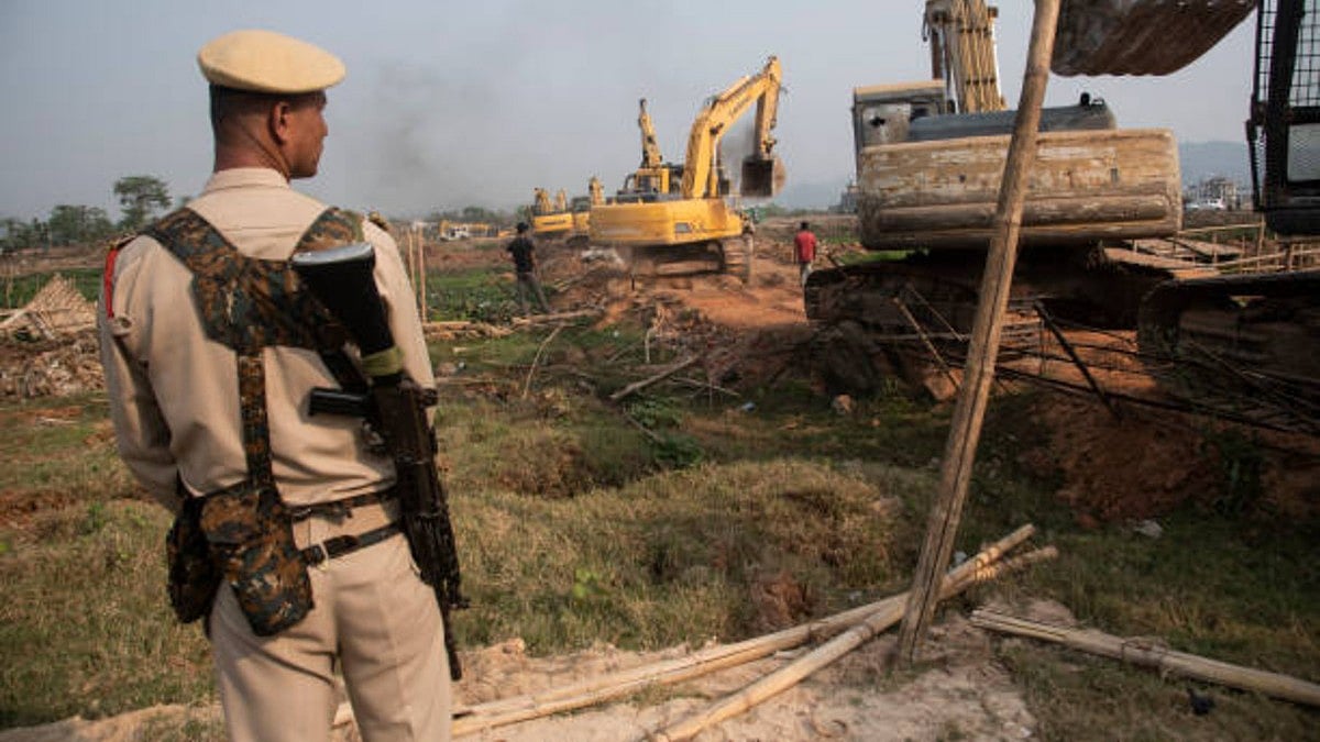 Bulldozer being used to demolish alleged illegal structures (Getty Images)