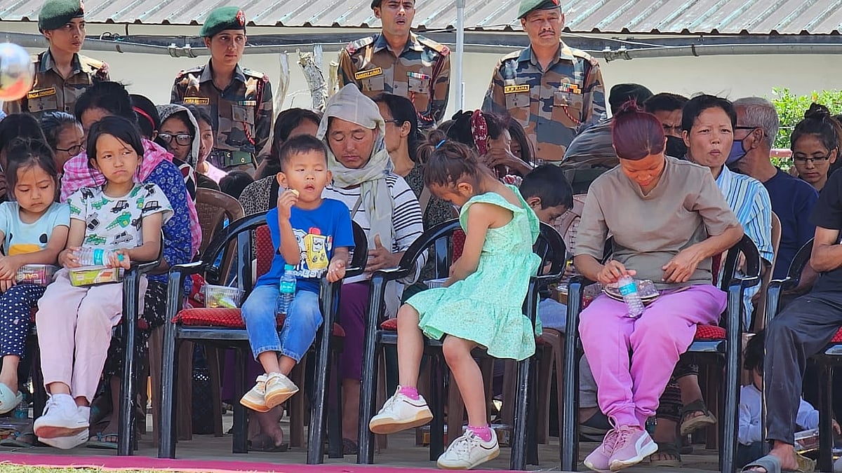 Children take shelter. (Photo: IANS)