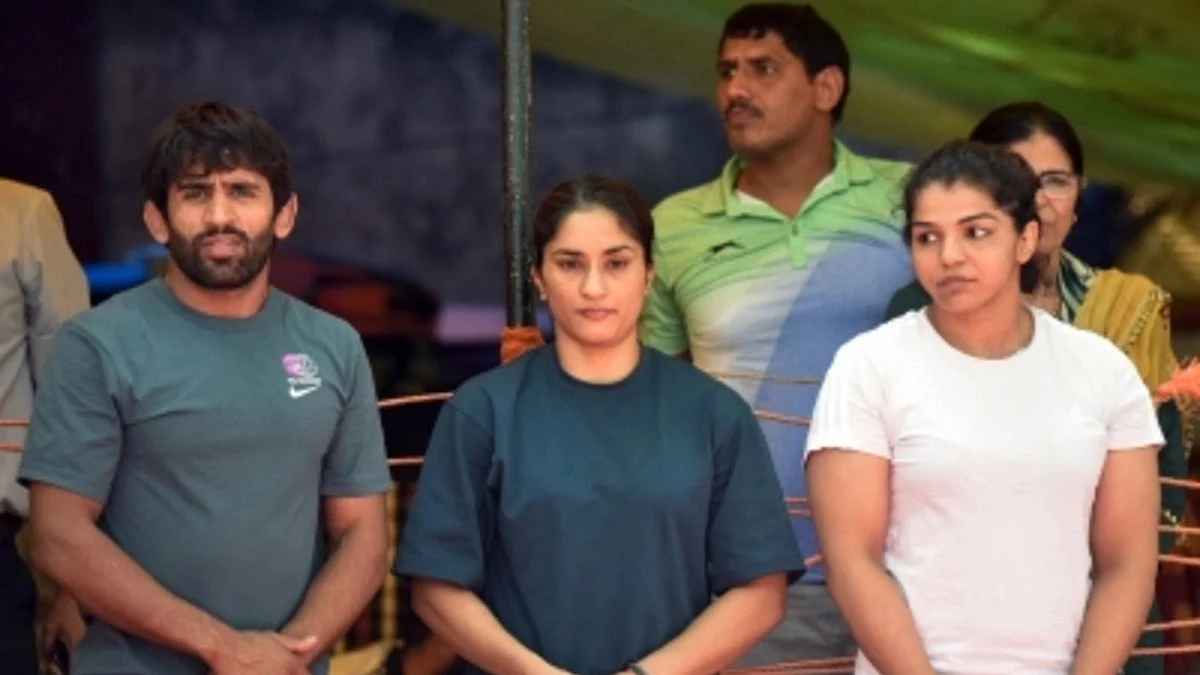 Bajrang Punia, Vinesh Phogat and Sakshi Malik (photo: IANS)