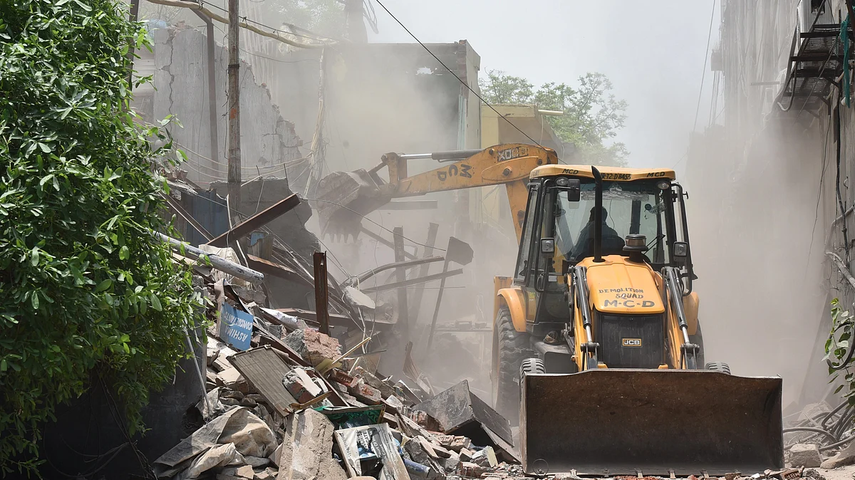 Representative image of a bulldozer being used during a demolition drive