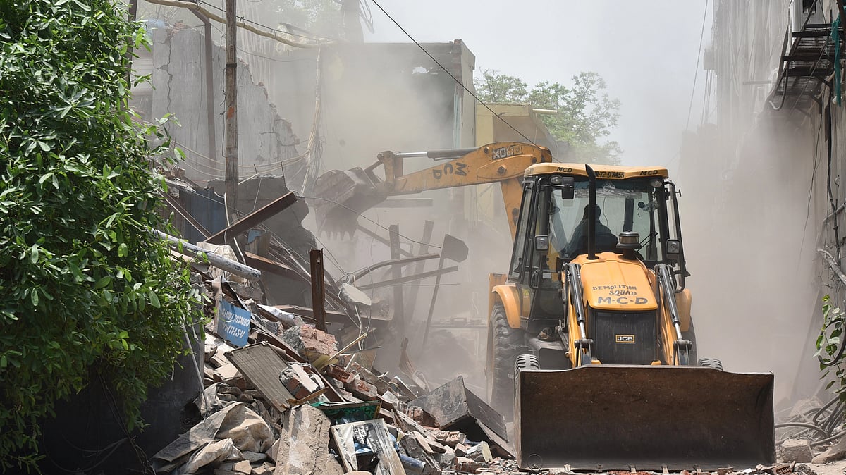 Representative image of a bulldozer being used during a demolition drive