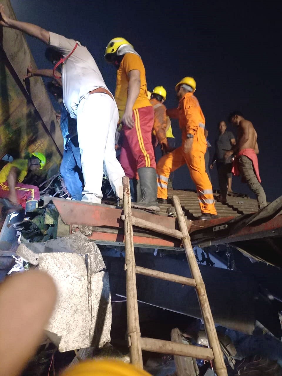 Rescue operations around 10pm in Balasore on the night of Friday, 2 June (photo: Biswanath Swain/IANS)