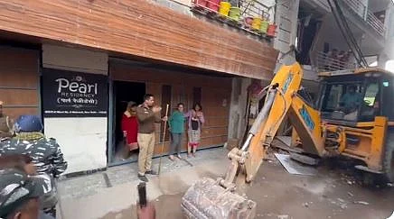 Erecting monuments, razing dreams
