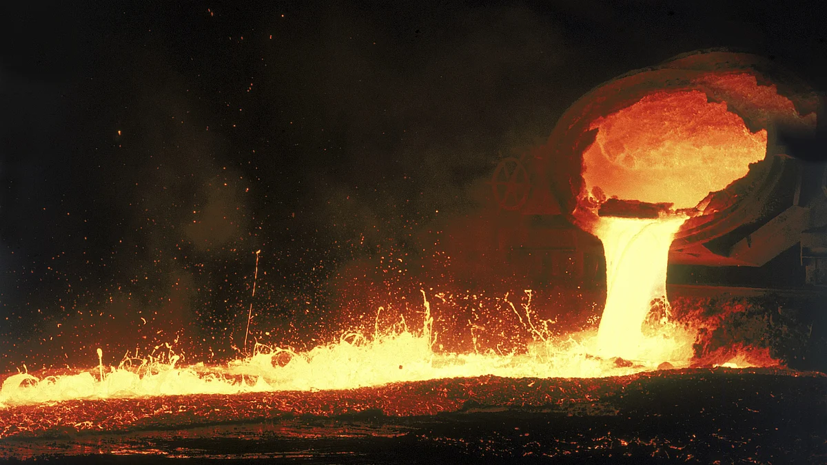 Representative image of a steel smelting furnace pouring out molten metal in a foundry (photo: Mediacolors/Construction Photography/Avalon/Getty Images)