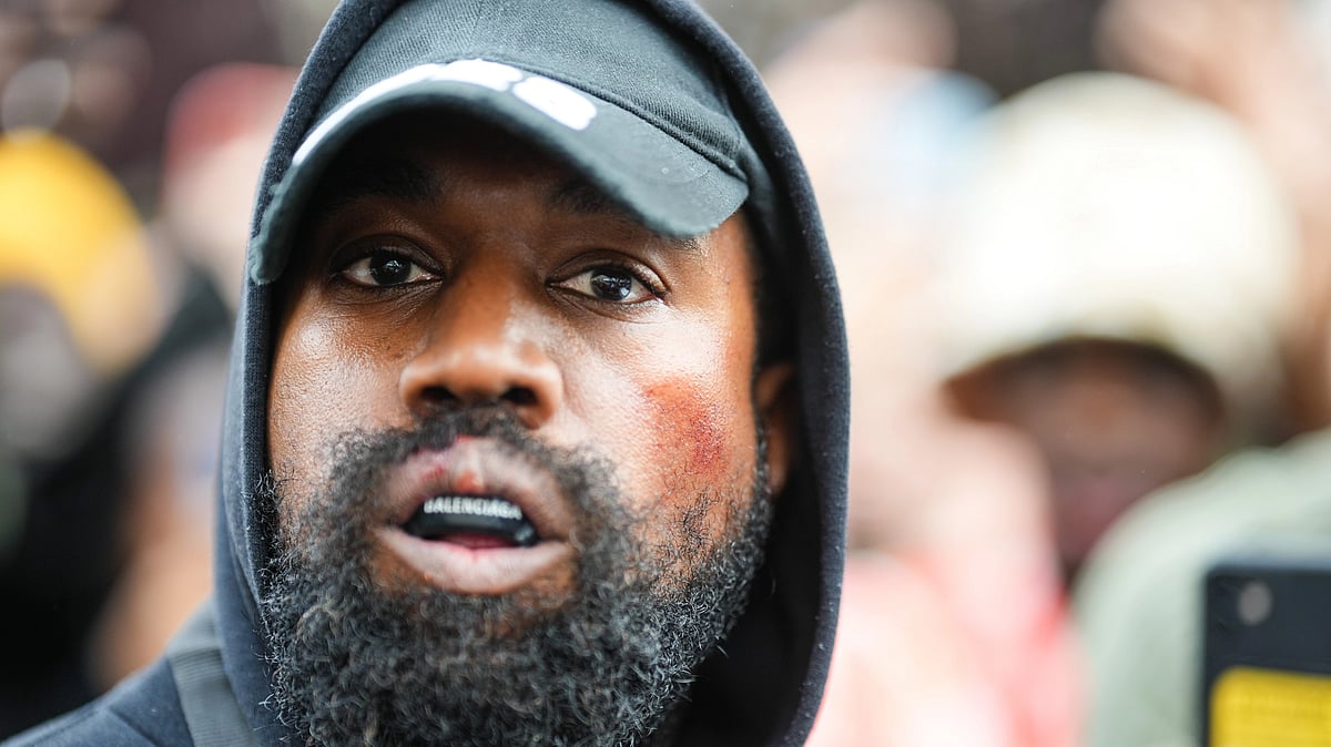 Kanye West 'sued for assault, battery, negligence' after row with paparazzi
