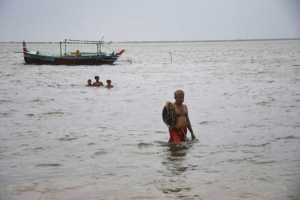 Photo Story: Pakistan braces itself for Cyclone Biparjoy landfall