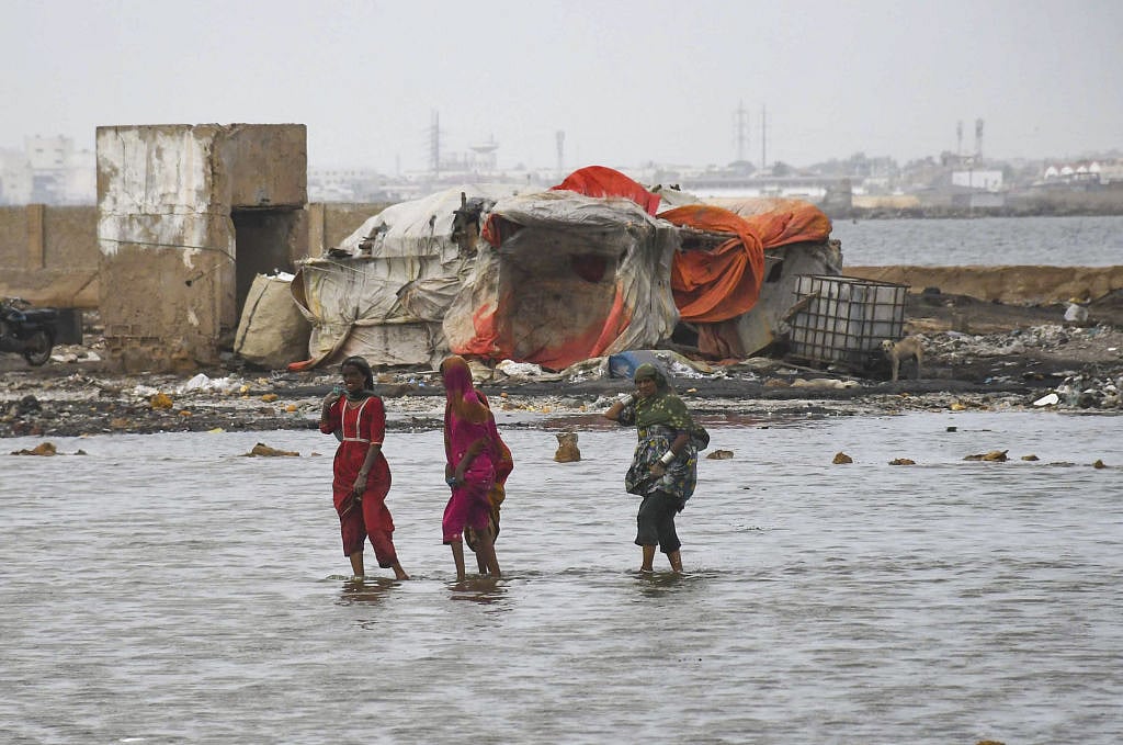 Photo Story: Pakistan braces itself for Cyclone Biparjoy landfall