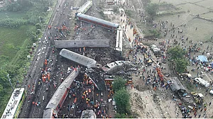 An aerial view of the accident site at Bahanaga Bazar railway station in Odisha’s Balasore district, where three trains collided in a three-way crash on 2 June (Photo: Getty Images)