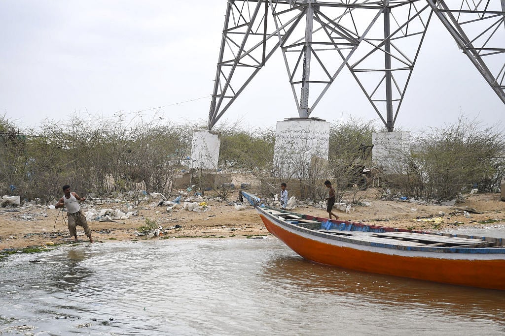 Photo Story: Pakistan braces itself for Cyclone Biparjoy landfall