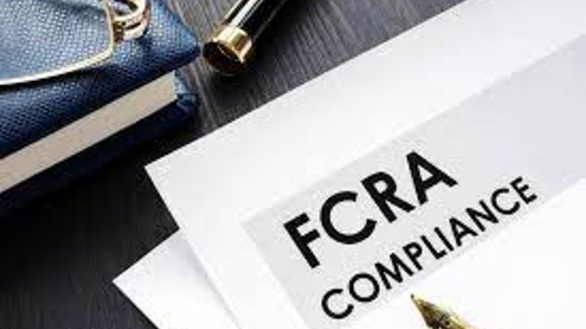 A sheet of paper with the words 'FCRA Compliance' (photo courtesy taxconcept)