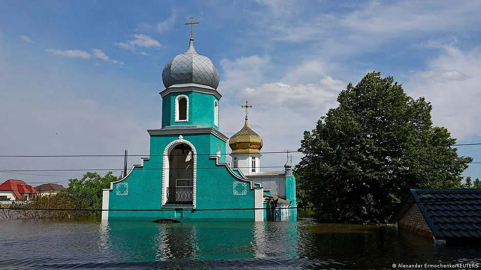 A church submerged under water after the dam burst (photo: DW)