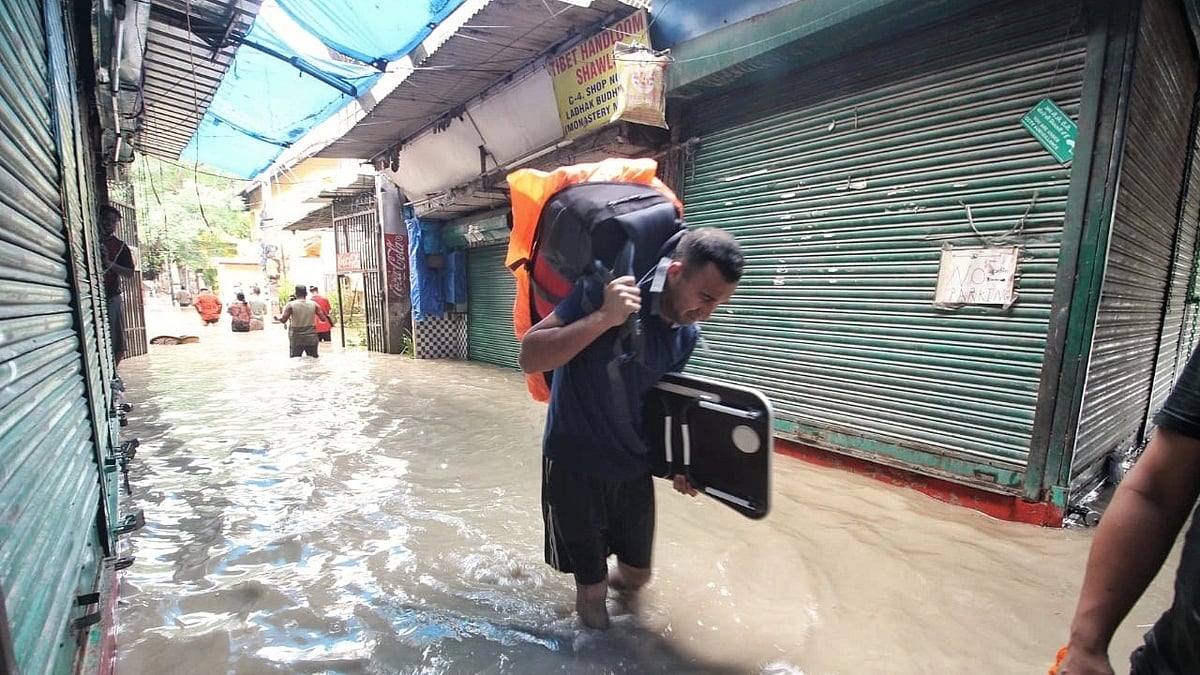 Flooded alley at the Monastery Tibet Market area after heavy monsoon rains caused the rise in waters of Yamuna river in New Delhi, on Wednesday, July 12. (photo: Vipin/National Herald)