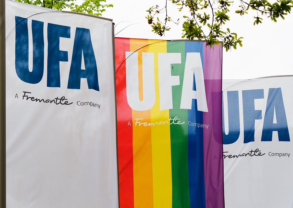 The company flags along with the pride flag at the headquarters of UFA GmbH in Dianastrasse in Babelsberg in June, 2022. The subsidiary of the Bertelsmann media group is considered one of the largest German companies in the field of TV production.
