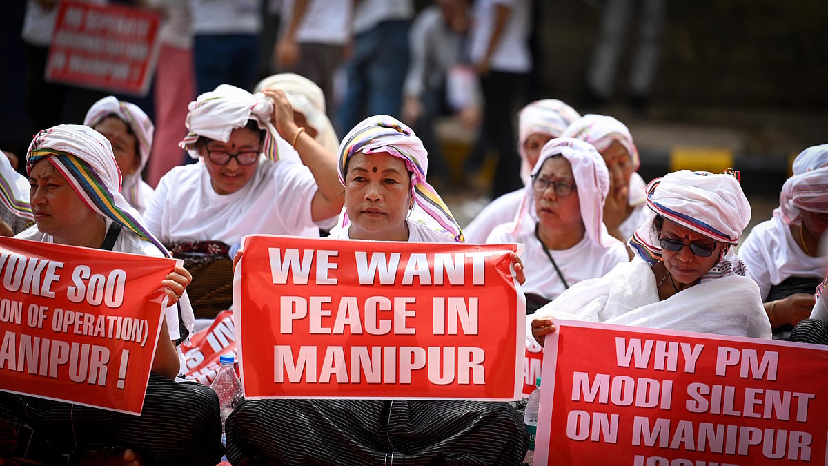 Women from Manipur raise slogans during a protest over the ongoing violence in the state, at Jantar Mantar (Photo: Getty Images )