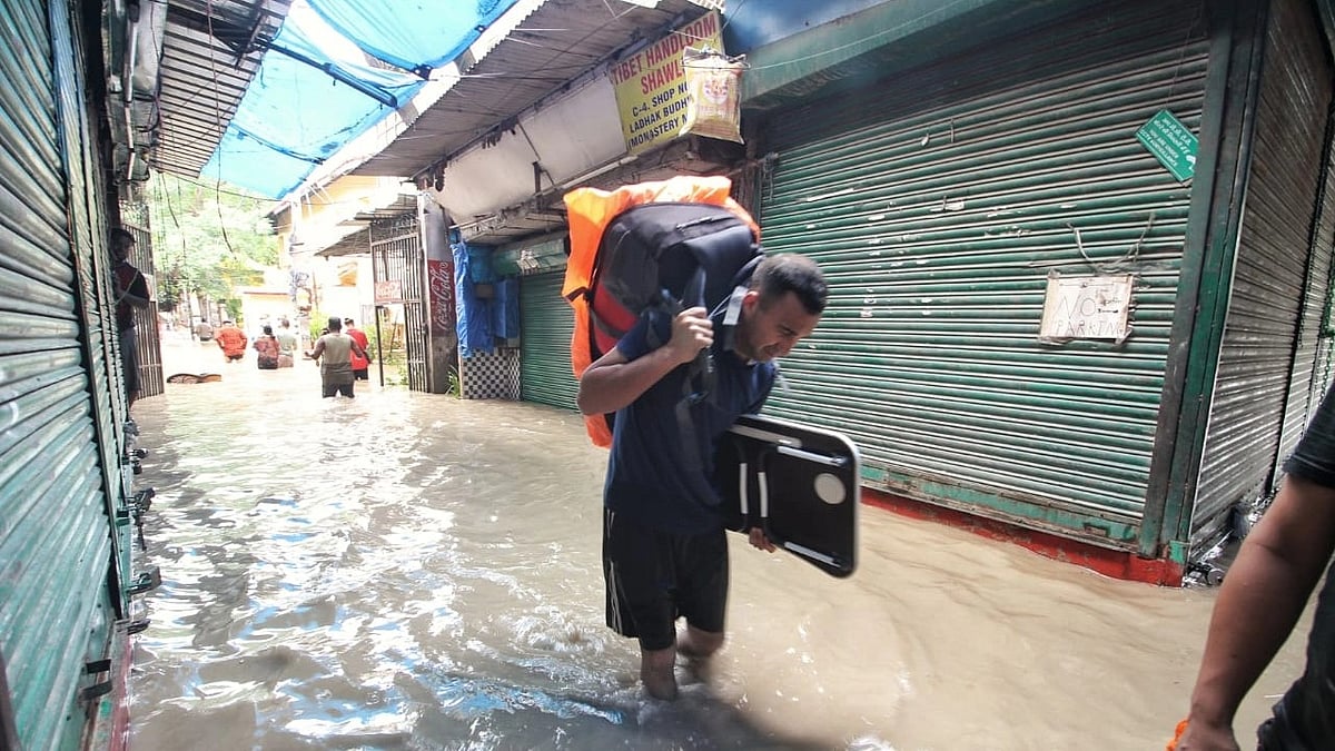 Flooded alley at the Monastery Tibet Market area after heavy monsoon rains caused the rise in waters of Yamuna river in New Delhi, on Wednesday, July 12. (photo: Vipin/National Herald)