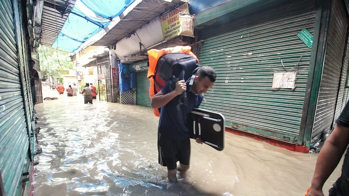 Flooded alley at the Monastery Tibet Market area after heavy monsoon rains caused the rise in waters of Yamuna river in New Delhi, on Wednesday, July 12. (photo: Vipin/National Herald)