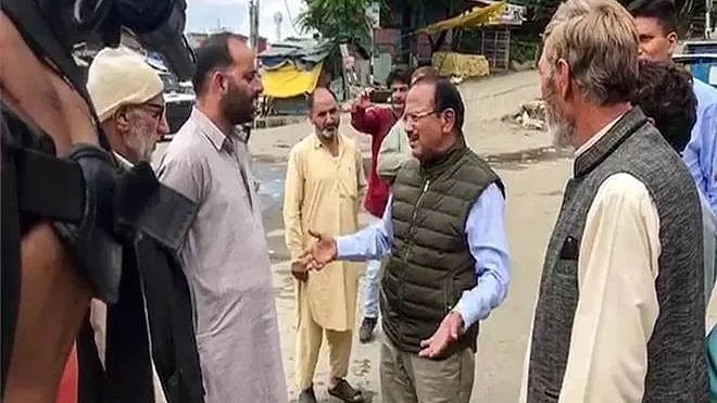 NSA Ajit Doval interacting with Kashmiris in the wake of abrogation of Article 370 (photo: NH library)
