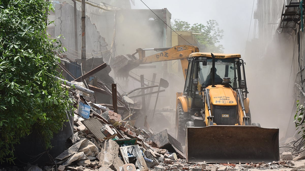 Temple and mazaar removed in Delhi's Bhajanpura for flyover