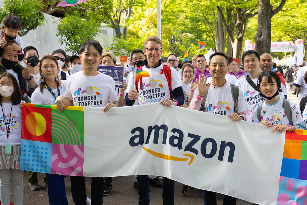 Amazon (USA) representatives pose for a photo during the Tokyo Rainbow Parade 2023. Japan is the only member of the G7 countries where same sex marriage is not legal. As per Data For Progress research, Amazon is a top donater to powerful politicians who are openly anti-queer