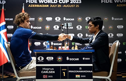 India's prodigy chess player R Praggnanandhaa on the right side with Norwegian Grandmaster Magnus Carlsen (photo: IANS)