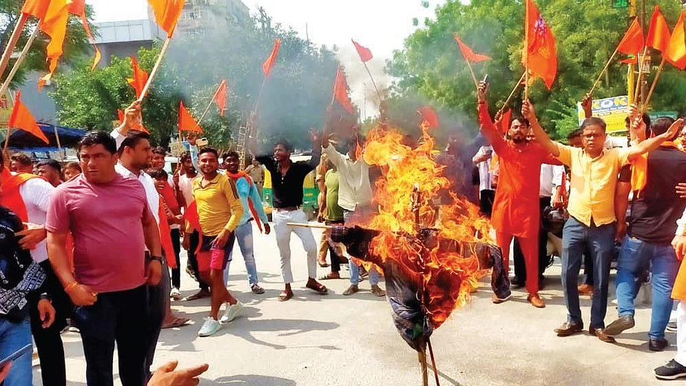 Bajrang Dal and VHP activists stage a threatening demonstration in Ghaziabad after communal violence in Haryana’s Nuh, 2 August 2023 (Photo: Getty Images)