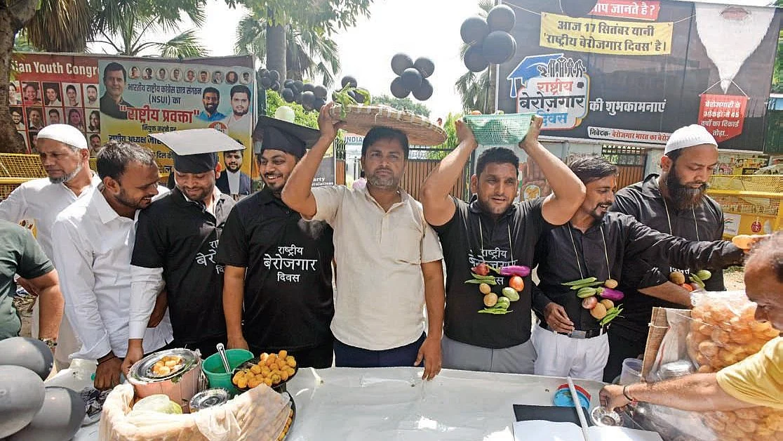 Educated jobless youth at a ‘Berozgari Mela’ in Delhi organised on PM Modi’s birthday to highlight the problem of rising unemployment in the country (Photo: Getty Images)