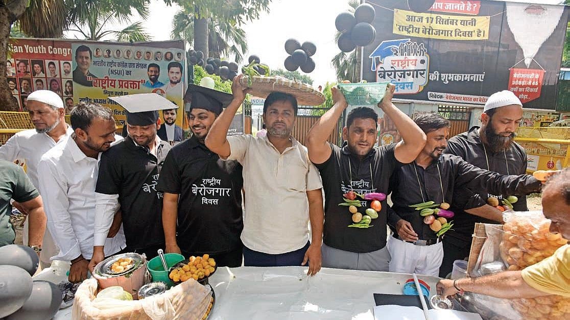 Educated jobless youth at a ‘Berozgari Mela’ in Delhi organised on PM Modi’s birthday to highlight the problem of rising unemployment in the country (Photo: Getty Images)