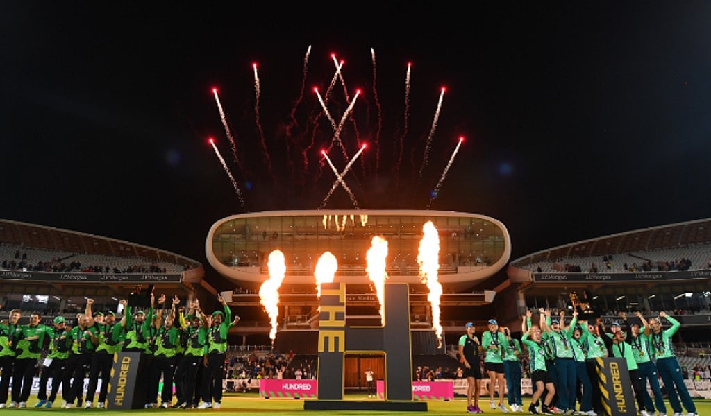 Winners of the men and women's titles after the 2022 event 