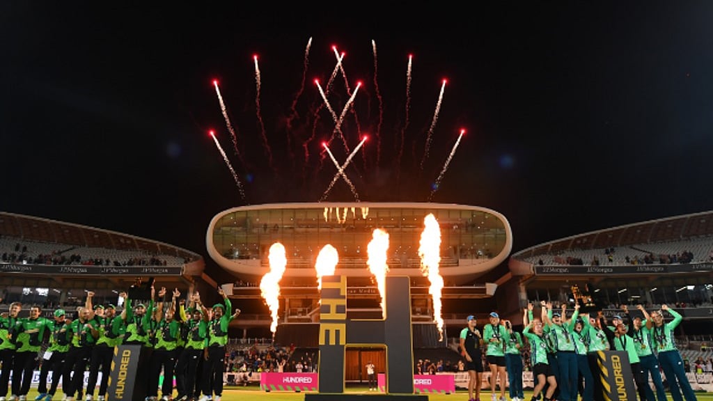 Winners of the men and women's titles after the 2022 event