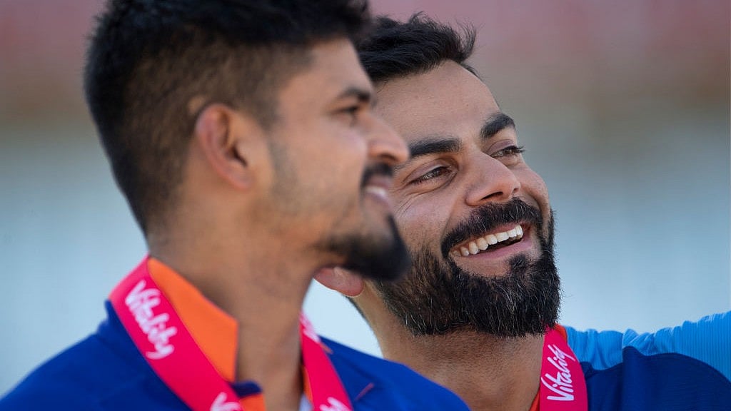 Shreyas Iyer (left) and Virat Kohli share a laugh (photo: Visionhaus/Getty Images)