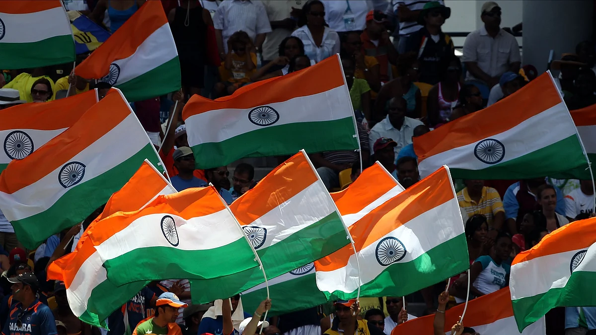 Representative image: A crowd waves the Indian flag (photo: Getty Images)
