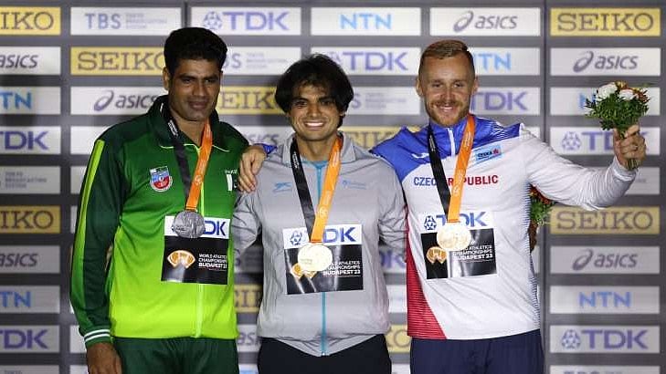 Neeraj Chopra who won a gold medal is seen with silver medallist Pakistan's Arshad Nadeem, and Czech Republic's Jakub Vadlejch who won the bronze in javelin throw at the World Athletics Championship 2023 (photo: Getty Images)