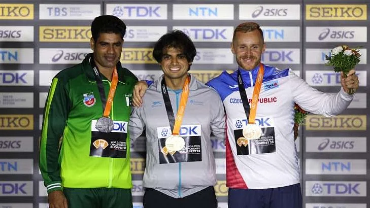 Neeraj Chopra who won a gold medal is seen with silver medallist Pakistan's Arshad Nadeem, and Czech Republic's Jakub Vadlejch who won the bronze in javelin throw at the World Athletics Championship 2023 (photo: Getty Images)