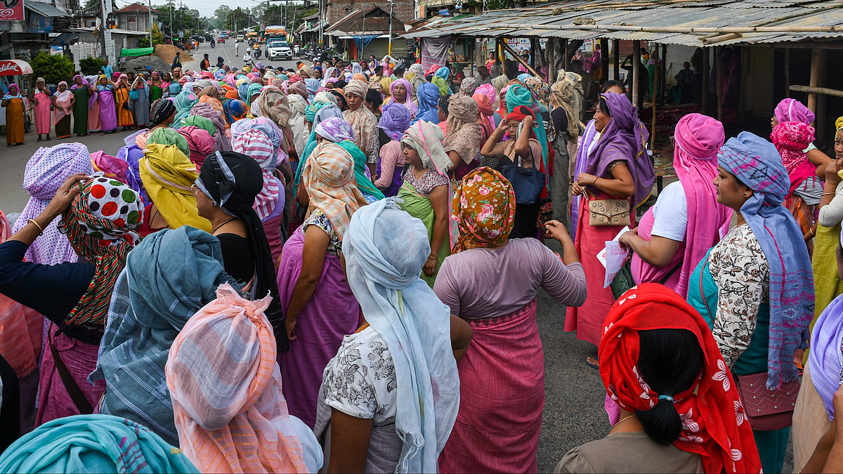 Women from the women's activist group Meira Paibi (which literally means women torch bearers) blocked several roads in Imphal, Bishnupur and Thoubal districts (Photo by Biplov Bhuyan/SOPA Images/LightRocket via Getty Images)