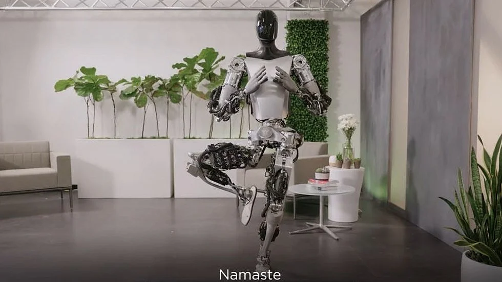 Tesla's humanoid robot Optimus showcases Yoga, self-calibration and task learning in new video.(screen grab from @elonmusk/X)