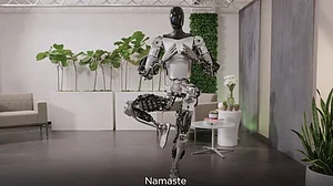 Musk showcases Tesla humanoid robot demonstrating Yoga and other tasks