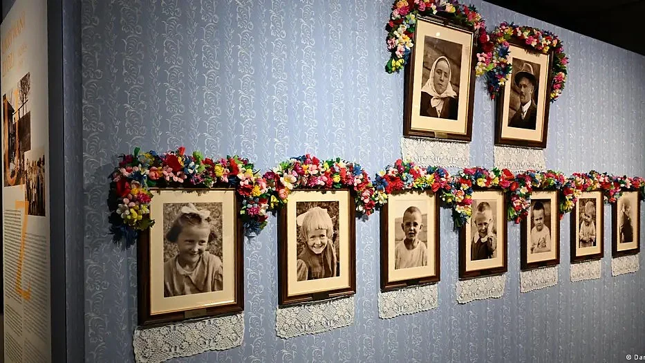 Portraits of the Ulma family members at a museum in Markowa (photo: Darek Delmanowicz/PAP/dpa via DW)
