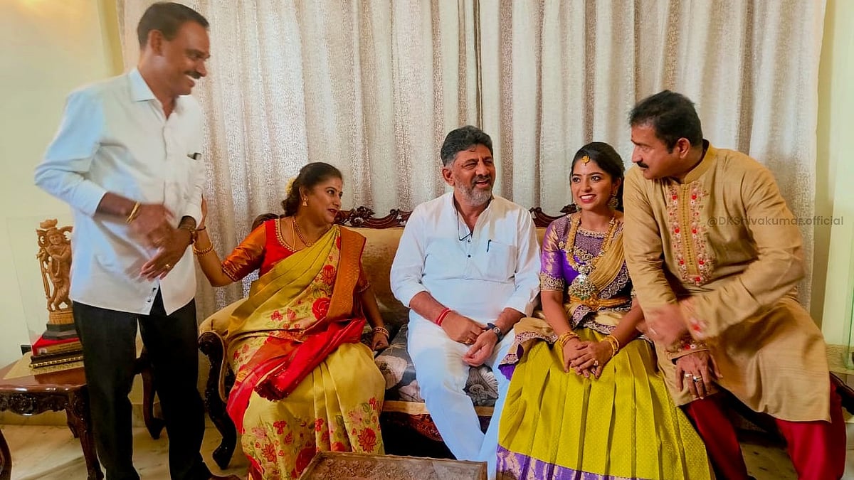 Kanataka deputy chief minister D.K. Shivakumar (centre) claims he only visited BJP leader Poornima Srinivas to celebrate Janmashtami (photo: IANS)