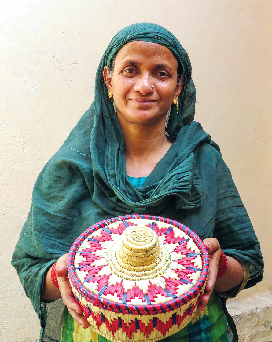 Aasma Begum is an expert craftsperson who trains women in moonj craft