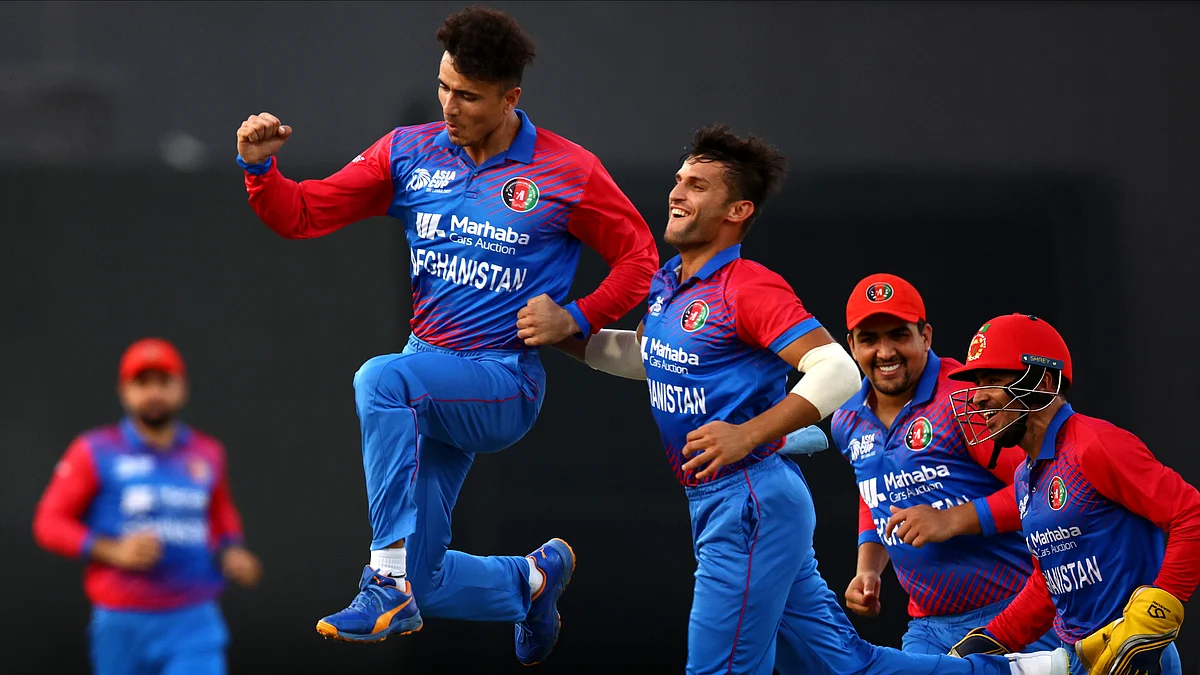 Mujeeb ur Rahman of Afghanistan celebrates a wicket during a World T20 match against Bangladesh in Sharjah in August this year (photo: Getty Images)