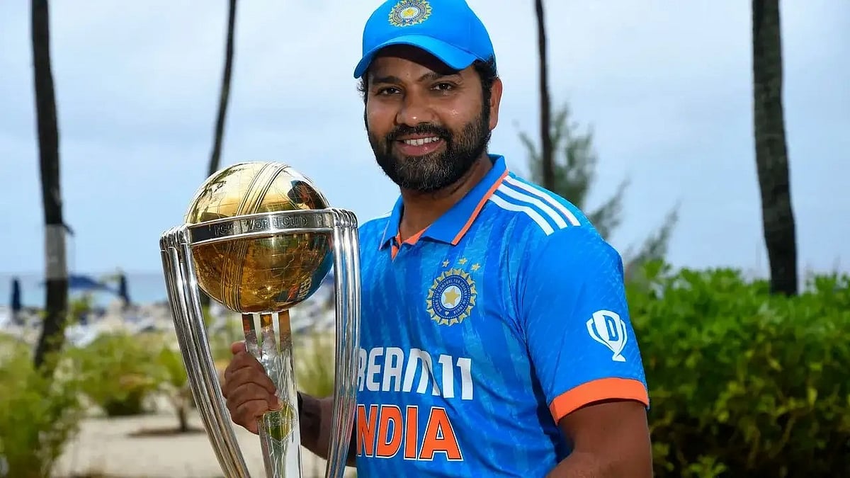 Rohit Sharma with the ICC World Cup trophy. (photo: @BCCI/Twitter) 