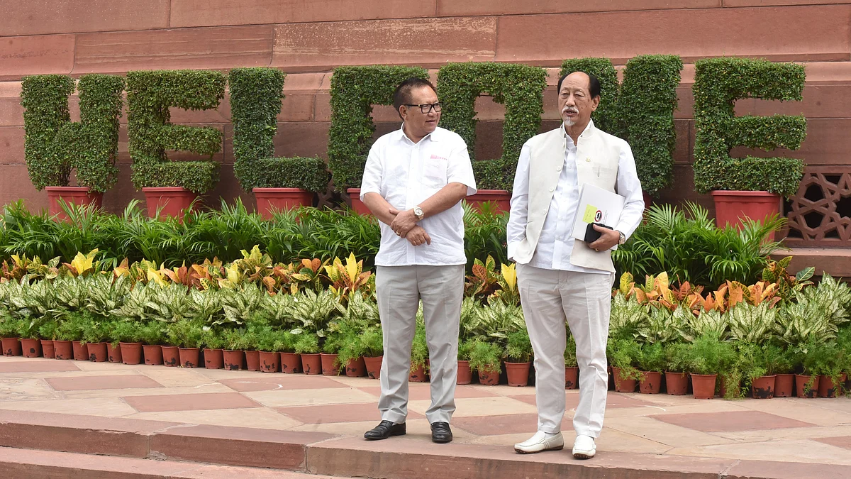 Nagaland chief minister Neiphiu Rio (right) at the Parliament House complex during the monsoon session on 4 August 2023 (photo: Sonu Mehta/Hindustan Times via Getty Images)