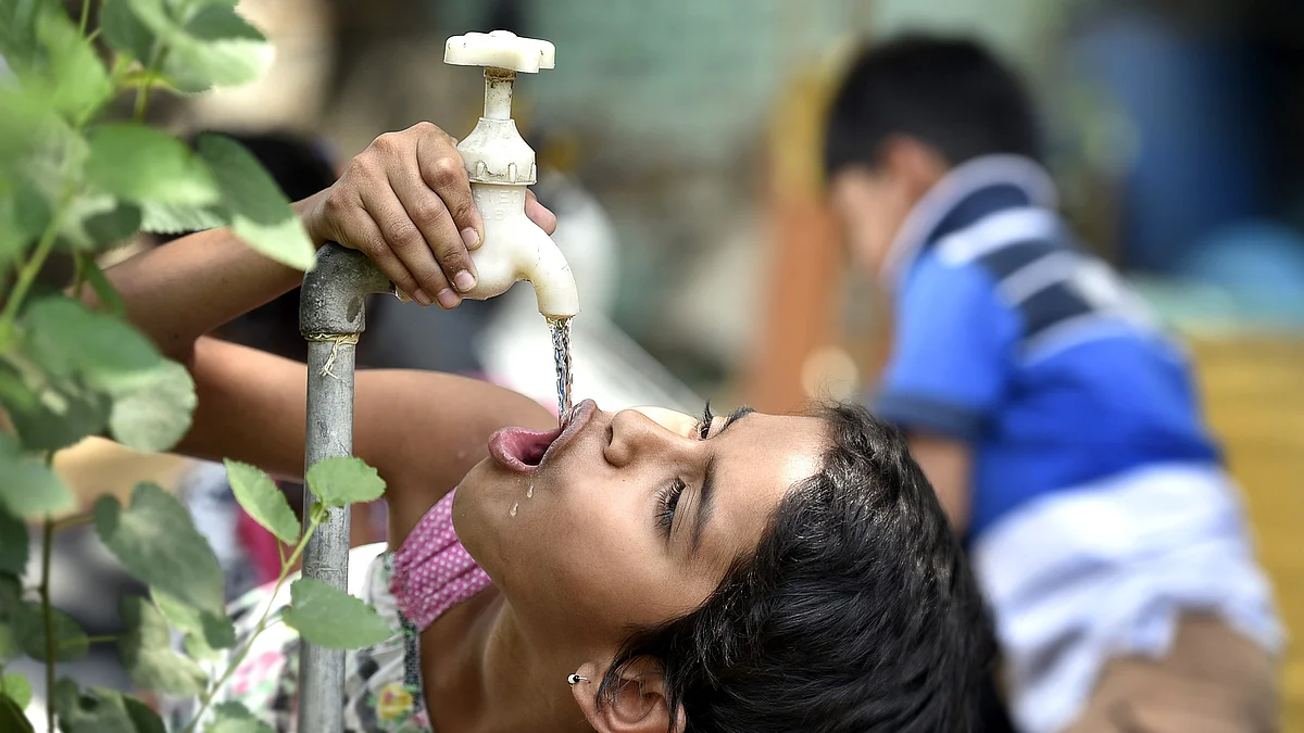 Representative image of a child drinking water (photo: Raj K Raj/Hindustan Times via Getty Images)