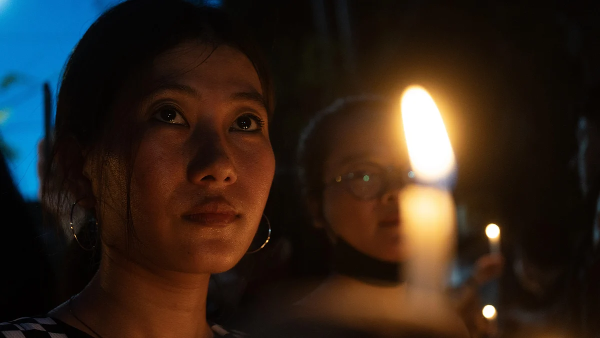 File photo of a candlelight protest (photo: David Talukdar/NurPhoto via Getty Images)